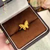 Anel de ouro tipo loja de joias, ouro de areia, laço duplo tridimensional para mulheres, moderno, simples, design de nicho, anel ajustável de alta qualidade