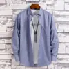Taobao comercio exterior al por mayor para hombre color liso moda manga larga actividades moda casual para hombres jóvenes ropa de pulgada