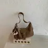Bolso de axila para mujer, nueva colección otoño 2026, moderno, retro, con un toque de alta gama, adecuado para el uso diario y para ir al trabajo, versátil bolso de hombro o bolso cruzado