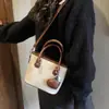 Bolsas Texturizadas de Moda Transfronterizas 2025 Invierno Nuevo Estilo Retro Bolso de Hombro Cruzado Moda Bolso Bandolera Tipo Cubo para Mujeres
