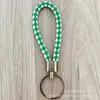Llavero de cuerda de cuero trenzado simple creativo colgante de muñeca linda accesorios de llave para parejas tendencia regalos pequeños venta al por mayor