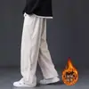 Pantalones gruesos de pana con forro polar personalizados de otoño e invierno para hombre, pantalones casuales rectos holgados, estilo primavera, de pierna ancha fluidos hasta el suelo