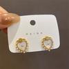 Pendientes elegantes de lujo de alta gama con forma de nicho y aguja de plata S925 de Corea del Sur Dongdaemun