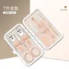 Set de cortauñas al por mayor, herramientas de manicura de acero inoxidable, cortauñas, set de 23 piezas en color dorado con caja, tijeras para uñas, tijeras para cutículas