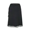 Conjunto de verano coreano casual de ajuste ceñido para mujer con top de tirantes de lunares negros y falda recta
