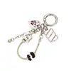 Cadena Personalizada Nueva de Hueso de Serpiente de Metal Colgante Decorativo para Bolso Creativo Cara Sonriente Cuadrada Llavero con Colgante de Perlas