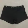 Verano Calle Alta Retro Estilo Ins Moda Simple Estilo Gótico Sexy Color Sólido Pantalones Cortos Casuales para Mujer con Decoración de Remaches