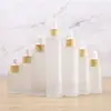 Botella de Vidrio Transparente para Aceite Esencial con Anillo de Imitación Madera Gotero Botella Esmerilada Botella Vacía Reempaquetada Botella Cosmética Venta al por Mayor en Stock