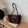 Elegante bolsa de mano de gran capacidad estilo francés para principios de otoño 2026, bolso de hombro de nicho, alta costura, elegante, bolsa ligera para el hombro