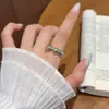 Anillo de blogger mismo estilo café dorado y turquesa azul para mujer, diseño abierto con diamantes, nicho de lujo ligero, anillo para dedo índice de alta gama y elegante