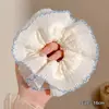 Novo scrunchie de alta qualidade para rabo de cavalo baixo 2026 para mulheres, apresentando um estilo inspirado em Melard, um acessório de cabelo retrô para outono e inverno
