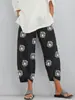 Comercio exterior transfronterizo 2021 Pantalones de mujer holgados con estampado de diente de león, cintura elástica, bolsillos 8843
