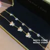 ¡Las mariposas bailan! Pulsera de flor de circón chapada en oro real, pulsera de atmósfera primaveral, joyería de diseño nicho para mujer