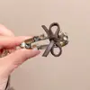 2025 Nuevo Clip de Pico de Pato con Hoja de Pedrería de Perlas Estilo Coreano Horquilla de Moda Clip para Flequillo Horquilla Lateral