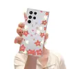 Fresco e curativo, este case de celular vermelho com estampa floral, leve e transparente é projetado para o Samsung S23 FE e oferece cobertura total com uma capa macia.