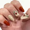 Manicura Transfronteriza Europea y Americana Otoño e Invierno Uñas Portátiles Moda Simple Flores Hojas Patrón Dorado Almendra Uñas Portátiles Al Por Mayor