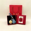 Chaveiro Pingente Dourado do Ano da Ovelha com Decoração em Folha de Ouro Conjunto em Caixa de Presente Personalizado para Negócios Presente Personalizado Atacado