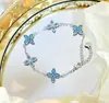 Pulsera Vintage de Flor Turquesa Azul Incrustada con Circonita, Pulsera de Flor de Cuatro Hojas de Lujo Ligero, Joyería Elegante de Alta Gama para Mujeres