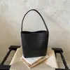 Bolso de mujer de alta gama 2026 nuevo de moda verano nicho patrón tejido bolso de hombro bolso cubo para ir al trabajo bolso de axila