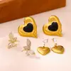 Nuevos Pendientes Colgantes con Forma de Corazón Chapados en Oro Real de Acero Inoxidable Europeos y Americanos para Mujer, Brazaletes para Orejas Personalizados de Sol y Luna, Pendientes Colgantes de Mariposa con Circonita