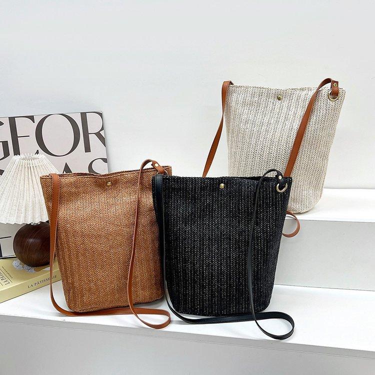 编织包女包新款潮2024夏草编简约百搭小清新水桶包个性单肩斜