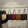 Bolsas de Mujer de Temporada 2026 Bolso de Mano de Moda Nuevo Bolso de Hombro para Mujer con un Toque de Lujo Versátil Bolso de Axila Vintage Exportación