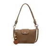 Elegante y minimalista bolso de mano pequeño tejido para mujer, nueva colección 2026, con un diseño de alta gama, lujoso y único, adecuado para llevar en el hombro, en la mano o como bolso cruzado