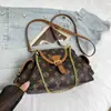 Bolsa de Tesoro de Cordón de Gama Alta de Nicho para Mujer Nueva Moda 2025 Bolso Versátil de Hombro Cruzado Gran Capacidad Bolso de Viaje