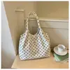 Bolso de mano con lunares texturizados minimalista transfronterizo para mujer, nuevo modelo 2026, bolso de mano/hombro de pana versátil de alta gama