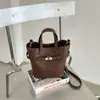 Bolso de Mano con Textura de Lichi para Mujer 2026 Nuevo de Moda Otoño Retro Versátil Bolso de Hombro para Viajes Cotidianos Bolso Cruzado Tipo Cubo