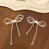 Aretes de Tachuela de Lujo de Gama Alta con Borla y Lazo de Cristal Blanco Nicho Lujo Ligero Diseño Distintivo Exquisito Aretes de Moda para Mujer