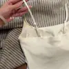 Camisole estilo cartoon transfronteiriça com bojos embutidos, projetada para realçar o busto, criar uma cintura fina e proporcionar um caimento valorizador como peça externa ou interna.