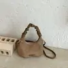 Bolso de mujer único retro esmerilado, nuevo bolso cruzado versátil otoño e invierno 2026, bolso de mano pequeño exquisito y súper popular