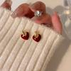 Hong Kong estilo retro vermelho Amor gota esmalte brincos stud nicho feminino design de alta qualidade temperamento moda ano novo all-match brincos