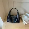 Bolso liso de color para axila estilo perezoso 2026 verano nuevo bolso tipo empanada alta para el trabajo y el trayecto bandolera