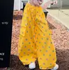 Camiseta de Manga Corta Estampada de Lunares para Niña 2026 Nuevo Estilo de Verano Diseño de Estampado Completo Estilo Americano Pantalones Curvos Conjunto de Dos Piezas