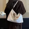 Gran capacidad 2026 brillante bandolera individual bolso de día versátil bolso de mano de otoño lujo ligero cruzado nuevo estilo moda para ir al trabajo coreano