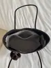 Bolso tote nuevo estilo coreano con estampado de leopardo para principios de otoño de 2026, bolso de hombro de gran capacidad para el trabajo y los desplazamientos, bolso de mano simple y único