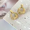 Aretes geométricos tridimensionales irregulares estilo retro europeo y americano joyería transfronteriza