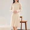 Vestido de Punto 100% Lana Pura 2026 Otoño Temprano Nuevo Elegante Versátil Moda Cuello Redondo Rejuvenecedor Vestido al por Mayor