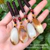 Suministro directo de fábrica de jade afgano con colgante de piedra cruda de cuero, imitación de semilla de jade de Xinjiang Hetian, colgante de jade, cadena de suéter