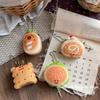 Nuevo colgante de muñeca de pan de pastel gourmet, corazón de niña, llavero de bolsa que combina con todo, colgante de muñeca lindo y creativo