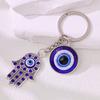 LLavero de ojo de diablo nuevo europeo y americano, llavero de ojo azul, colgante de aleación, joyería, accesorios de fábrica al por mayor