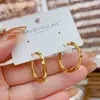 Pendientes de Aro Metálicos Geométricos de Moda Sencillos Sentido de Diseño Nicho Temperamento Celebridad de Internet Pendientes para el Trabajo Pendiente de Tono Frío