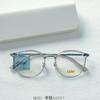 Marco de gafas de moda con caja de libro roja pequeña con pegamento de titanio B, se puede equipar con estudiantes masculinos y femeninos con miopía, revestimiento IP rojo neto