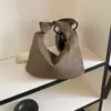 Bolso de moda de estilo francés de alta gama para el verano 2026, bolso de hombro para llevar debajo del brazo, bolso versátil y moderno tipo 'dumpling'