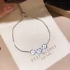 Pulsera de flor de circonita y nácar chapada en oro real de 18k, pulsera de estilo coreano ins de alta gama, joyería versátil de lujo ligero para mujer