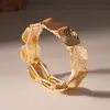 Pulsera elástica de empalme de piezas redondas estilo metal europeo y americano Pulsera de estilo minimalista con sentido del diseño Joyería versátil para mujer