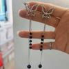 Pendientes de clip para oreja sin perforación, con borla de cuentas de cristal negro y mariposa de diamantes de imitación hueca, de lujo ligero, alta calidad, moda y temperamento