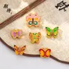 Esperando los mismos accesorios dorados para manualidades esmalte cloisonné mariposa con agujero pasante accesorios de joyería de personalidad creativa